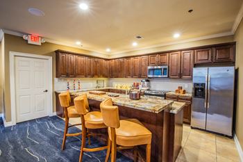 He courts at preston oaks apartment homes resident clubhouse with coffee bar